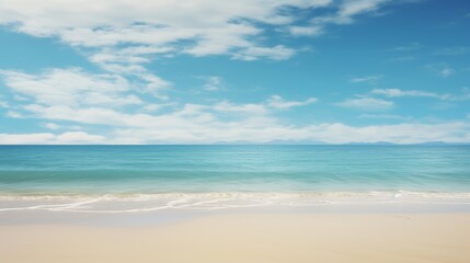 Fototapeta premium casting a warm light on a sandy beach and turquoise ocean.