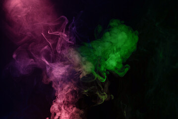 Green and pink steam on a black background.