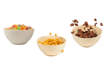 Colorful cereal box for morning breakfast. Corn flakes falling to the white bowl. Motion.