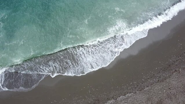 Waves crashing on the shore.