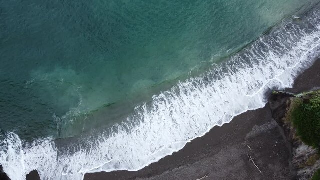 Waves crashing on the shore.