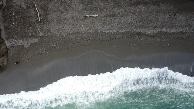 Waves crashing on the shore.