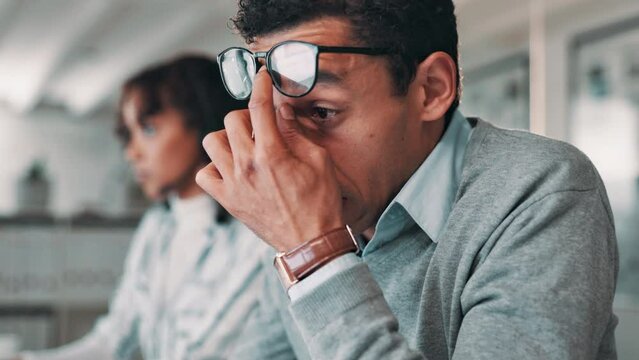 Stress, anxiety and eye strain by businessman with glasses in office overwhelmed by deadline panic, audit or tax review. Typing, vertigo and auditor frustrated by blurred vision, burnout or dizzy