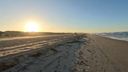 Traveling on summer vacation by the beach at Cape Hatteras National Seashore in Outer Banks, North...