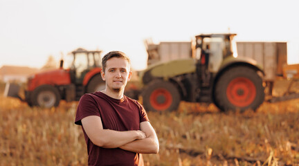 Concept banner farm small business in agricultural industry. Portrait young man farmer in cornfield...