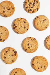 Chocolate chip cookies on white background, top view