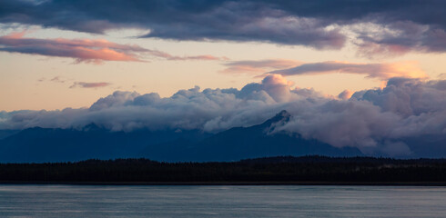 Dramatic Sunrise over Alaska Coast. Nature Background