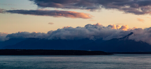 Dramatic Sunrise over Alaska Coast. Nature Background