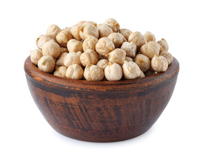 Clay bowl full of chickpeas isolated on white background.