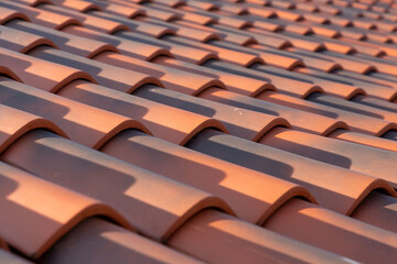 Orange colored classic corrugated roof tiles