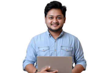 Smiling mid-age Indian man using a laptop.