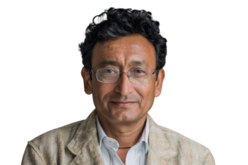 Confident Indian businessman smiling at the camera.