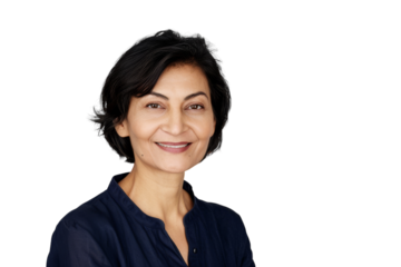 Confident Indian businesswoman smiling at the camera.