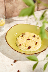 Authentic Brie and Pecan Risotto Still Life – Natural Sunlit Aesthetic on Beige Table