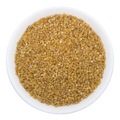 Wheat grains in a white plate png on a transparent background. Isolated. Top view