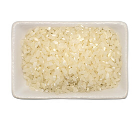 Rice grains in a white rectangular plate png on a transparent background. Isolated