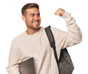 Young student man with a laptop raising fist after a victory, winner concept.