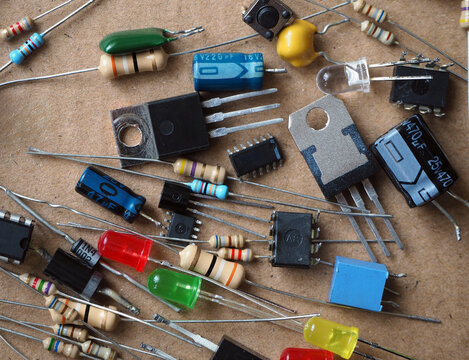 Various randomly placed electronic circuit components.