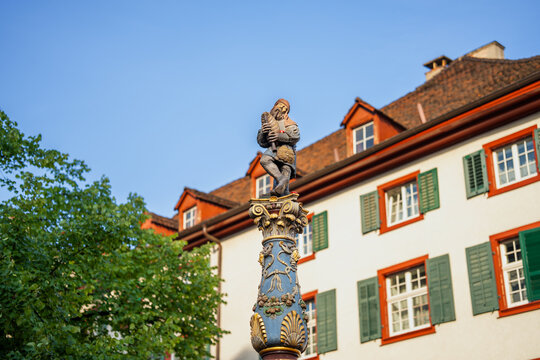 Low angle shot of the top of the column of the historic Holbein Fountain in Basel, Switzerland.