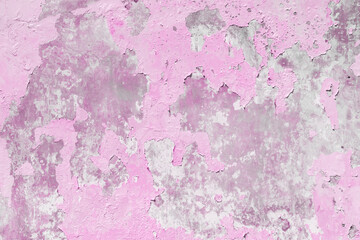 Vintage wall with pink and white texture. Old wall covered with pink and white paint that has a slightly faded look and rough texture.