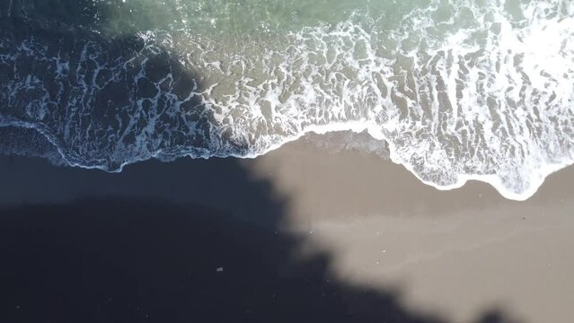 Waves crashing on the shore.