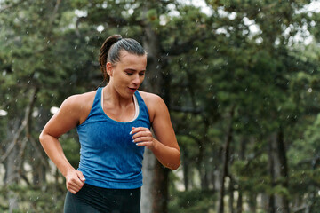 Unstoppable: A Determined Athlete Trains Through the Rain in Pursuit of Marathon Glory