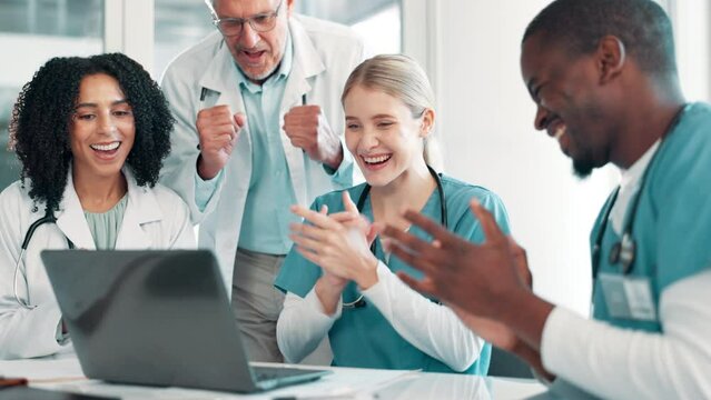 Laptop, applause and team of doctors and nurses in celebration, success and hospital discovery. Conference, healthcare and medical worker clapping with thank you, clinic and research deal support