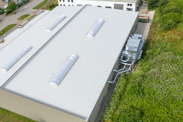 a ventilation and air conditioning system is attached to a factory building