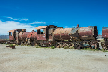 Naklejka premium Uyuni, Bolivia -March-31-2024: view of the famous Cementerio de Trenes (Train Cementery)