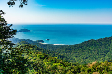 Castelhanos Beach seen from the middle of the forest on the island of Ilhabela on the north coast...