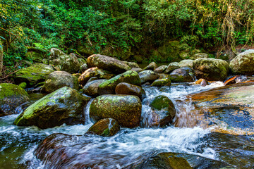 Waterfall among the rocks in the rainforest of Ilhabela on the north coast of Sao Paulo