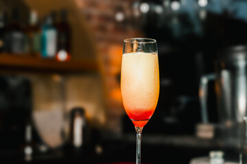 African-American bartender preparing cocktails at the bar, at an afrobeats event. Nightlife, partying and bartending. Style.