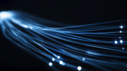 Closeup glowing lines of light that forms the shape of an electric cable, dark background