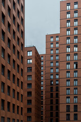 Facades of Multi-apartment new Buildings witn windows. Urban rhythm. 