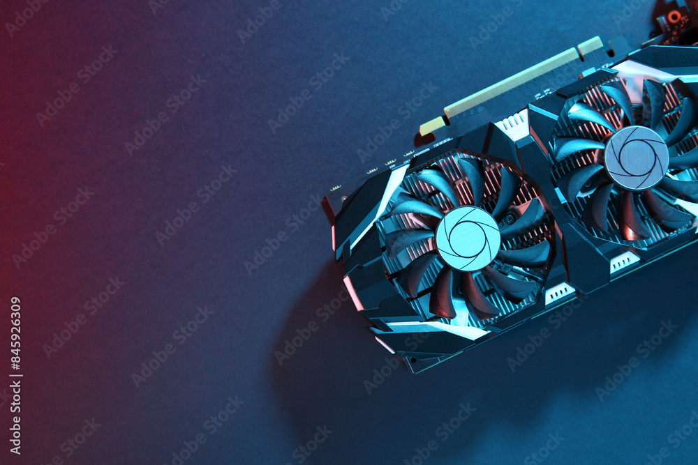 Fototapete computer graphics card on color background, top view. space for text