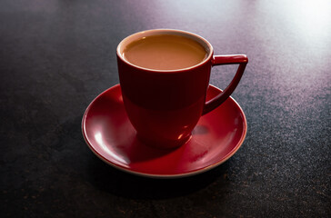 cup with  coffee  on the table