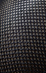 Abstract black dotted fabric pattern background            