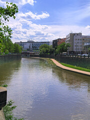 View of the city of Pilsen from the bridge over the river Mze in summer