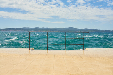 Railings on the waterfront in Zadar, Croatia.