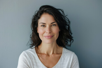 Fototapeta premium A close up portrait of a woman with a subtle smile