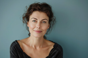 Fototapeta premium A close up portrait of a woman with a subtle smile