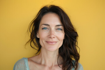 Fototapeta premium A close up portrait of a woman with a subtle smile
