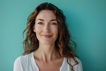 Fototapeta premium A close up portrait of a woman with a subtle smile