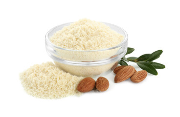 Fresh almond flour, nuts, branch with leaves and bowl isolated on white