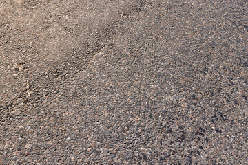 a part of a highway covered with asphalt
