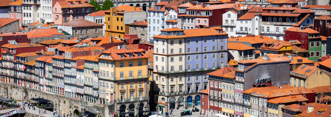 Fototapeta premium Panoramic view of UNESCO world heritage site Porto city in Portugal during sunny day with blue sky.