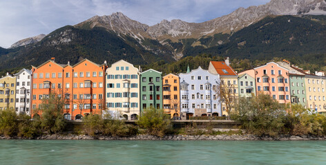 Panoramic view of row of colorful historic buildings in Innsbruck city, Austria