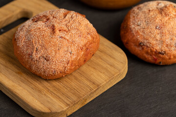 a red bun with the addition of red beetroot vegetables