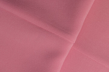 a piece of clothing made of pink fabric