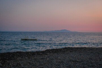 Sea view from the beach at sunset.